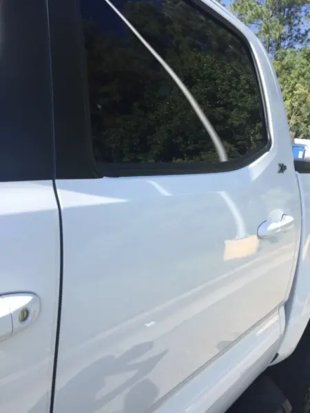 KARS Dents door after