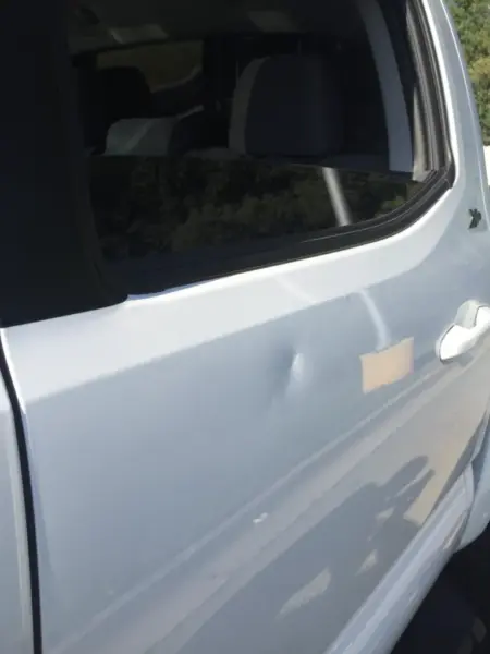 KARS Dents door before